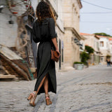 Robe formelle boutonnée à manches longues de couleur unie