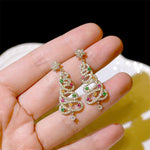 Boucles d'oreilles arbre de Noël brillant