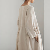 Robe en coton et lin à col rond de couleur unie