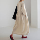 Robe en coton et lin à col rond de couleur unie