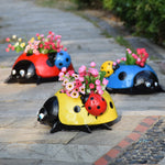 Pot de fleurs coccinelle en métal