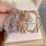 Boucles d'Oreilles Torsadées à la Mode