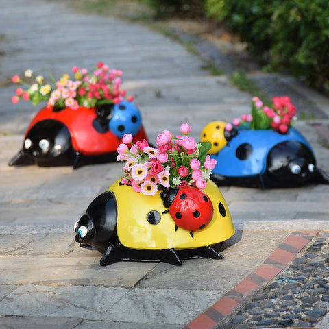 Pot de fleurs coccinelle en métal