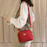 Mini sac à bandoulière en tissu Oxford