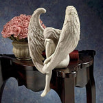 Ornement d'ange tenant une jambe