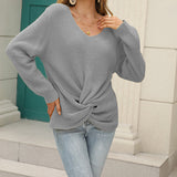 Pull en tricot noué