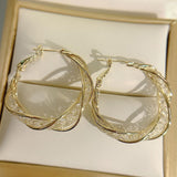 Boucles d'Oreilles Torsadées à la Mode