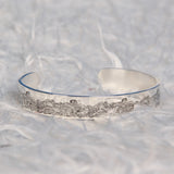 Bracelet ouvert en acier inoxydable inspiré