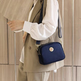 Mini sac à bandoulière en tissu Oxford