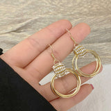 Boucles D'oreilles Géométriques Superposées en Diamant