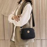 Mini sac à bandoulière en tissu Oxford