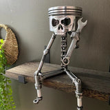 Sculpture de visage de crâne de piston