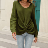 Pull en tricot noué