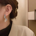 Boucles d'Oreilles Inspiration Feuille Brillante