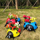Pot de fleurs coccinelle en métal