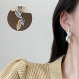 Boucles d'Oreilles Inspiration Feuille Brillante