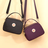 Mini sac à bandoulière en tissu Oxford