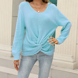 Pull en tricot noué