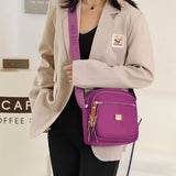 Sac à bandoulière léger et décontracté avec plusieurs poches pour femme