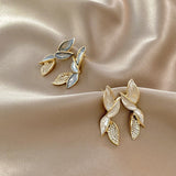 Boucles d'Oreilles Inspiration Feuille Brillante