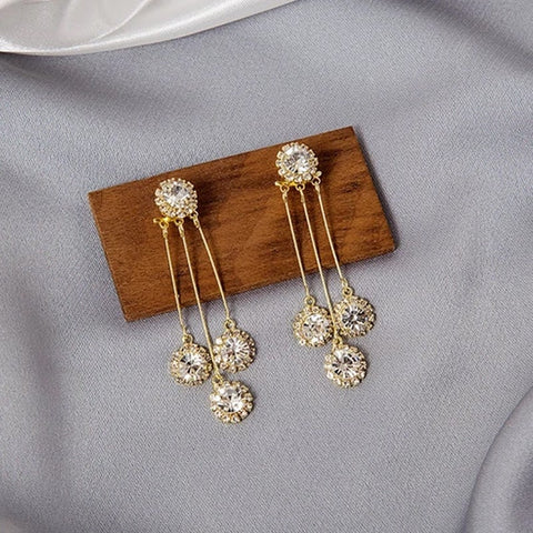Boucles d'oreilles avec pétales ronds en zircone
