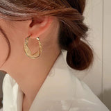 Boucles d'Oreilles Torsadées à la Mode