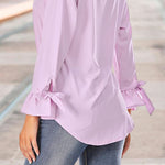 Blouse ample à manches évasées