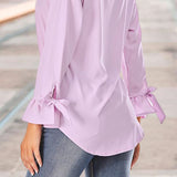 Blouse ample à manches évasées