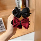 Pince à cheveux noeud papillon