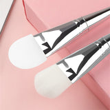 Brosse à poils doux et masque en silicone
