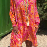 Robe mi-longue imprimée à manches longues