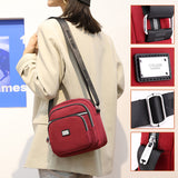 Petit sac à bandoulière carré en nylon de couleur unie