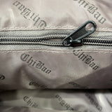 Sac en nylon monochrome avec fermeture zippée