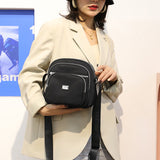 Petit sac à bandoulière carré en nylon de couleur unie