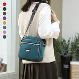 Petit sac à bandoulière carré en nylon de couleur unie