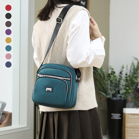 Petit sac à bandoulière carré en nylon de couleur unie