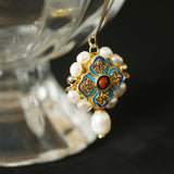 Boucles d'oreilles perle double émail