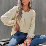 Chemisier uni à manches bouffantes et encolure ronde