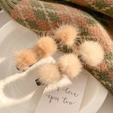 Clip de Bec de Canard en Boule de Poils