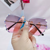 Lunettes de soleil hexagonales en diamant