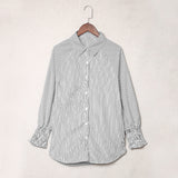 Chemise rayée à col montant et manches longues