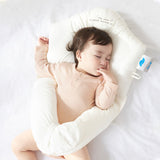 Oreiller apaisant en forme de bébé