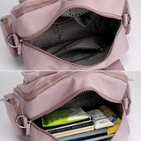 Sac à bandoulière étanche avec plusieurs poches pour femme
