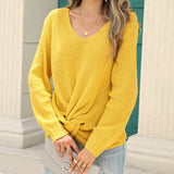 Pull en tricot noué