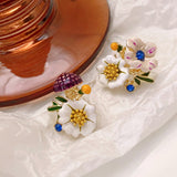 Boucles d'oreilles fleur de marguerite