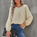 Chemisier uni à manches bouffantes et encolure ronde