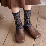 Chaussettes mi-mollet à fleurs en relief