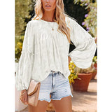 Elégant chemisier unicolore à manches longues