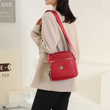 Sac à bandoulière léger et décontracté avec plusieurs poches pour femme