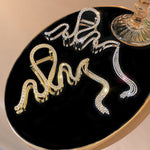 Barrette serpent avec strass